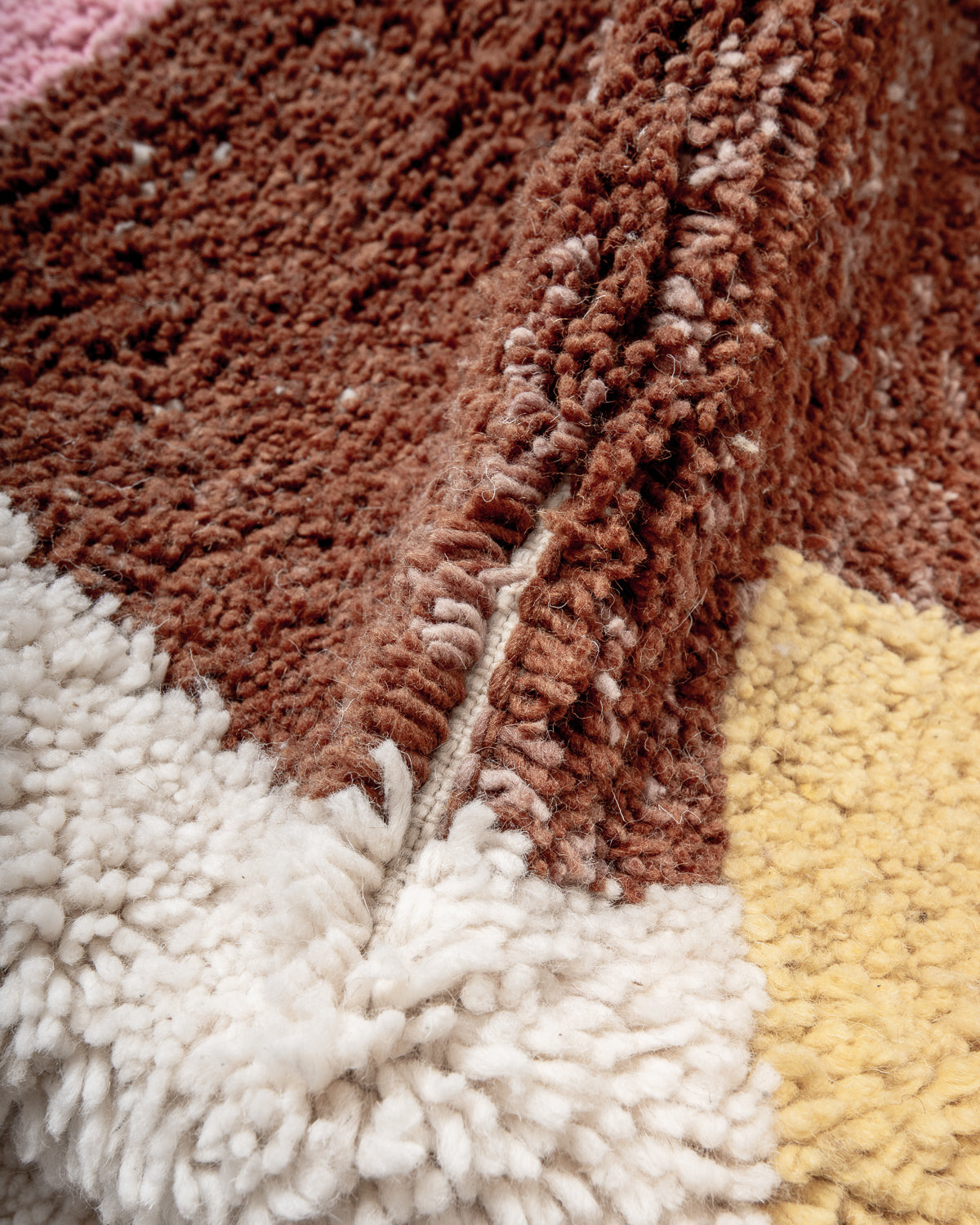 Modern, designer, handcrafted Berber rug from Morocco. Beniourain carpet with beautiful colours and patterns and fluffy wool texture.